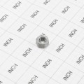 Aluminum 5/16" Hex Nut (Grid Shown For Scale)